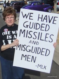 Me, holding a sign in the 2011 King Holiday Parade in Oklahoma City. 